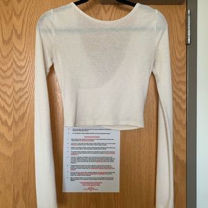 Cream Alo Yoga open-back long sleeve shirt